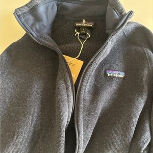 Patagonia women’s  Dark bluey Zip-Up Sweater new with tags